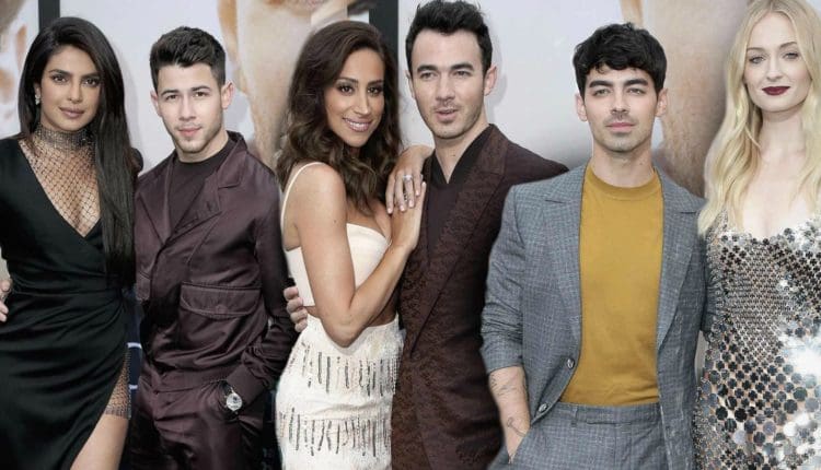 Jonas Brothers with their wives.