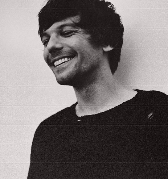 Louis Tomlinson smiling Faith In The Future black and white