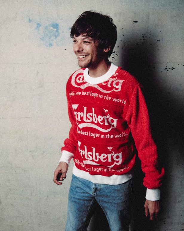 Louis Tomlinson smiling Faith In the Future photoshoot
