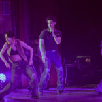 Singer songwriter JAY B, and some of his dancers, on stage in Chicago for his US tour tape: roots